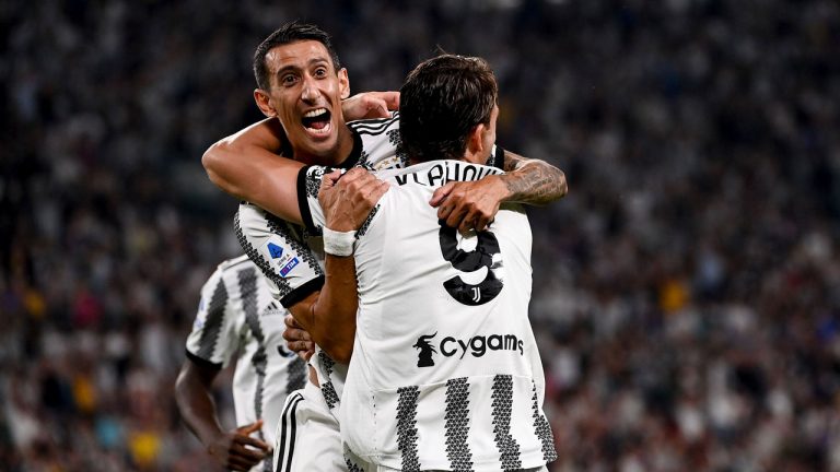 Juventus' Dusan Vlahovic and Angel Di Maria, behind, celebrate a goal during the Italian serie A soccer match between Juventus and Sassuolo at the Juventus Stadium. (Marco Alpozzi/AP)