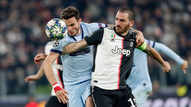 Juventus' Leonardo Bonucci, right, and Atletico Madrid's Saul Niguez challenge for the ball during the Champions League group D soccer match between Juventus and Atletico Madrid at the Allianz stadium in Turin. (Antonio Calanni/AP)