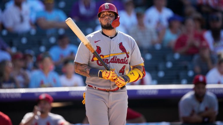 St. Louis Cardinals catcher Yadier Molina steps to the plate to bat as fans cheer during the ninth inning of the team's baseball game against the Colorado Rockies on Thursday, Aug. 11, 2022, in Denver. (David Zalubowski/AP)