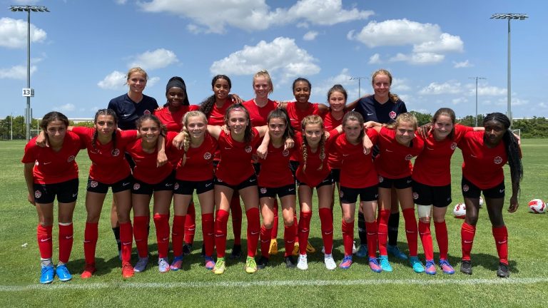 Canada’s girls’ U-15 team poses for a team photo in Tampa, Fla. in a Friday, July 29, 2022 handout photo. (HO-Canada Soccer/CP)