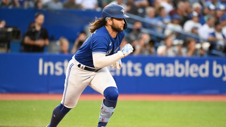 Toronto Blue Jays shortstop Bo Bichette runs out his double off Chicago Cubs starting pitcher Marcus Stroman in first inning interleague baseball action. (Jon Blacker/CP)