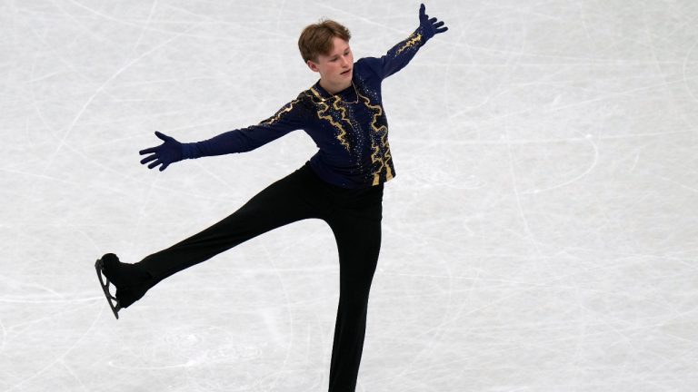Ilia Malinin of the U.S performs in the men free program at the Figure Skating World Championships in Montpellier, south of France, Saturday, March 26, 2022. (AP Photo/Francisco Seco)