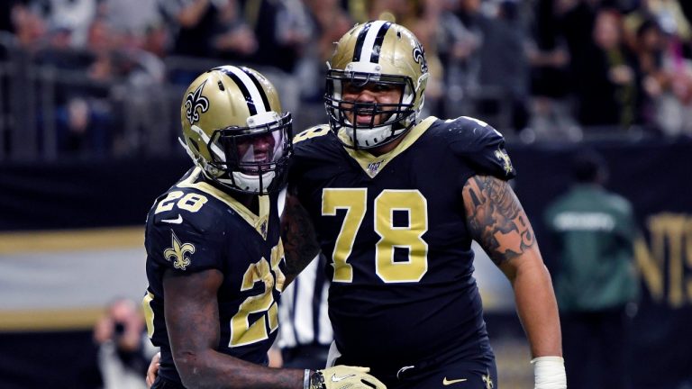 New Orleans Saints running back Latavius Murray (28) celebrates his touchdown carry with center Erik McCoy (78) in the second half of an NFL football game against the Arizona Cardinals in New Orleans, Sunday, Oct. 27, 2019. (AP Photo/Bill Feig)