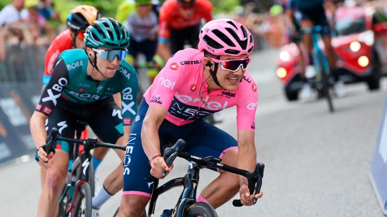 Ecuador's Richard Carapaz wears the pink jersey of the overall leader as he competes during the 19th stage of the Giro D'Italia cycling race, from Marano Lagunare to Santuario di Castelmonte, Italy, Friday, June 3, 2022. (Gian Mattia D'Alberto/LaPresse via AP)