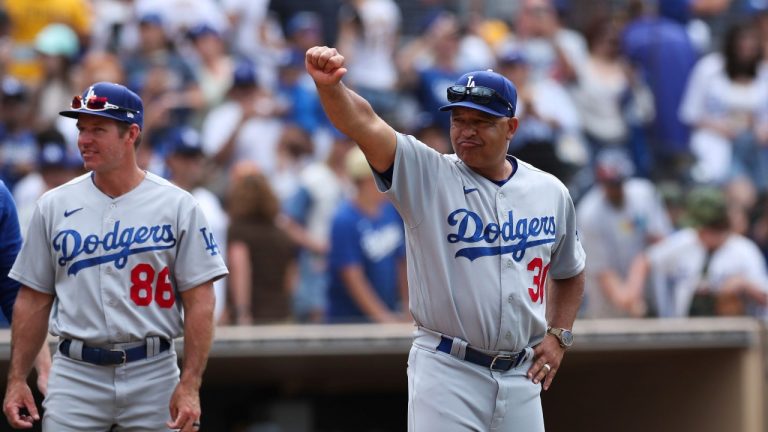 Los Angeles Dodgers manager Dave Roberts gestures to the crowd after the team defeated the San Diego Padres in a baseball game, Sunday, Sept. 11, 2022, in San Diego. (Derrick Tuskan/AP Photo)