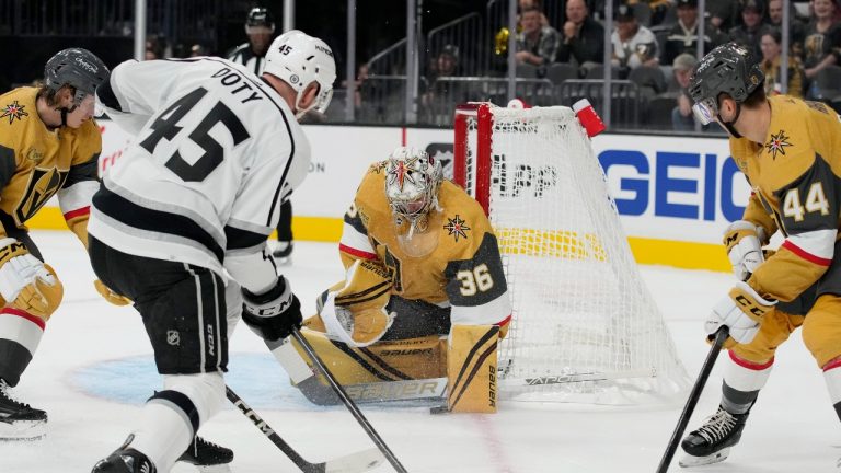 Vegas Golden Knights goaltender Logan Thompson (36) blocks a shot by Los Angeles Kings' Jacob Doty (45) during the first period of an NHL preseason hockey game Monday, Sept. 26, 2022, in Las Vegas. (John Locher/AP Photo)