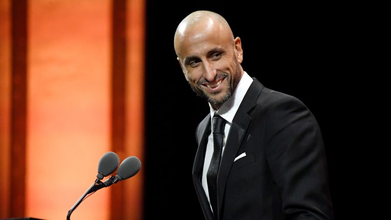 Manu Ginobili addresses a gathering during his enshrinement ceremony for the Basketball Hall of Fame, Saturday, Sept. 10, 2022, in Springfield, Mass. (AP Photo/Jessica Hill)