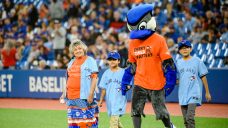 Residential school survivor throws first pitch at Blue Jays game on Orange Shirt Day
