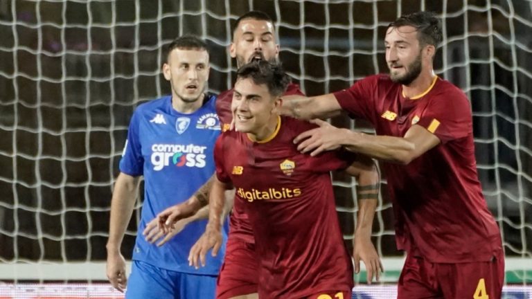 Roma's Paulo Dybala, center, celebrates after scoring a goal during the Serie A soccer match between Empoli and Roma, in Empoli, Italy, Monday, Sept. 12, 2022. (Marco Bucco/LaPresse via AP)