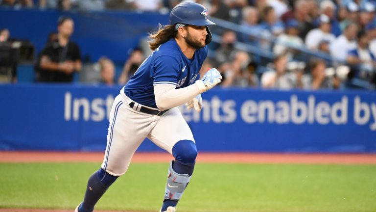 Toronto Blue Jays shortstop Bo Bichette runs out his double off Chicago Cubs starting pitcher Marcus Stroman in first inning interleague baseball action in Toronto on Tuesday, August 30, 2022. (Jon Blacker/CP)