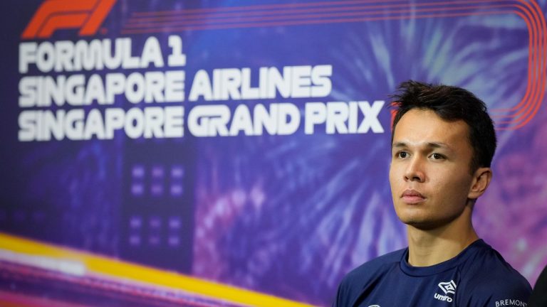 Williams driver Alexander Albon of Thailand listen to question during drivers press conference at the Marina Bay City Circuit ahead of the Singapore Formula One Grand Prix in Singapore, Thursday, Sept. 29, 2022. (Vincent Thian/AP)