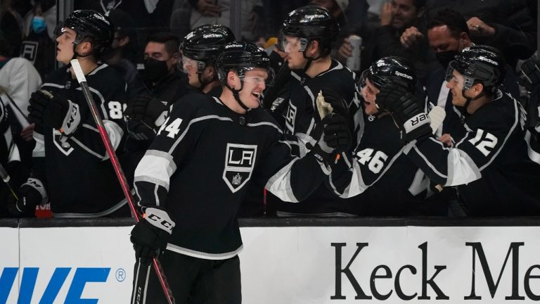 Los Angeles Kings' Mikey Anderson, center, celebrates his goal with teammates during the third period of an NHL hockey game against the Pittsburgh Penguins Thursday, Jan. 13, 2022, in Los Angeles. (Jae C. Hong/AP)