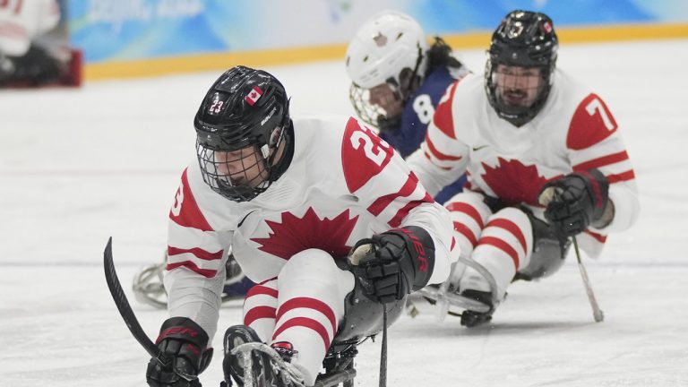 Liam Hickey of Canada controls the puck during their para ice hockey finals match against United States at the 2022 Winter Paralympics, Sunday, March 13, 2022, in Beijing. Liam Hickey scored twice as Canada opened the International Para Hockey Cup with a 3-0 win over Czechia on Saturday. (Dita Alangkara/CP, AP)