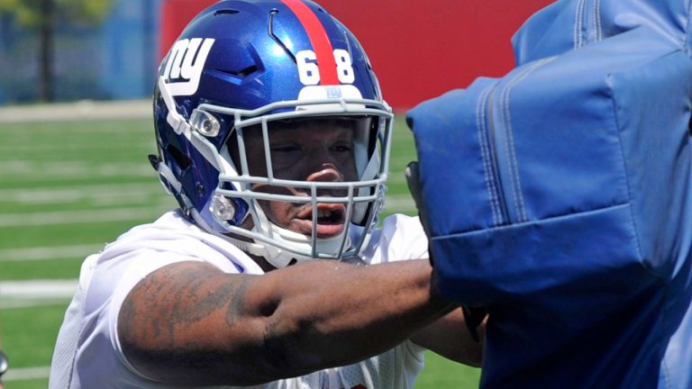 New York Giants seventh round draft pick, guard Bobby Hart, runs a drill during practice at the team's NFL football rookie minicamp Friday, May 8, 2015, in East Rutherford, N.J. (Bill Kostroun/AP)
