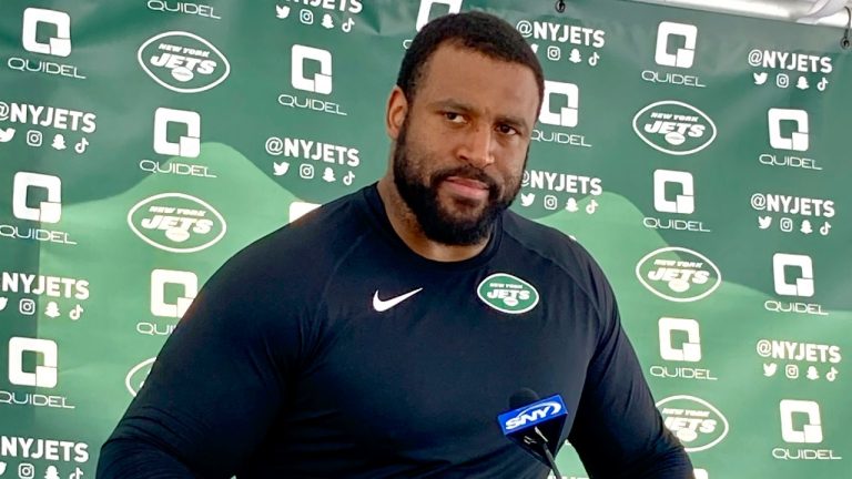 New York Jets offensive tackle Duane Brown speaks to reporters at the NFL football team training facility in Florham Park, N.J., Tuesday, Aug. 16, 2022. (Dennis Waszak Jr./AP)
