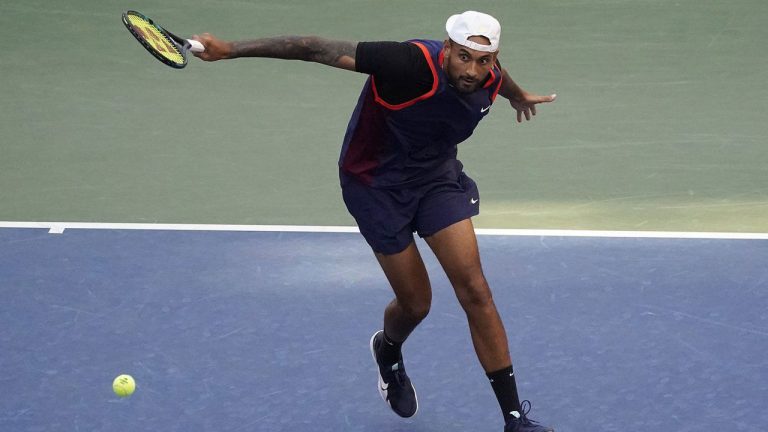 Nick Kyrgios, of Australia, returns a shot to Benjamin Bonzi, of France, during the second round of the US Open tennis championships. (John Minchillo/AP)
