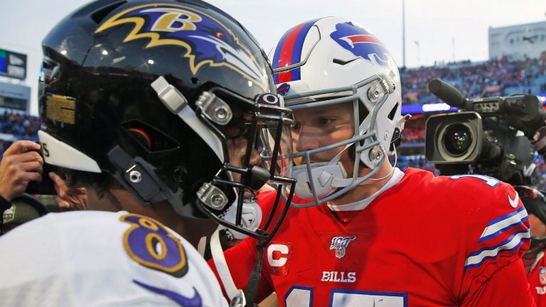 Buffalo Bills quarterback Josh Allen talks with Baltimore Ravens quarterback Lamar Jackson following a game. (John Munson/AP)