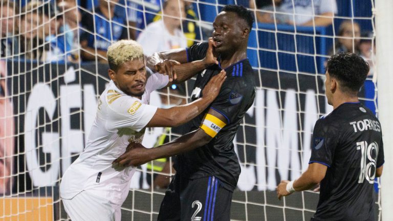 Atlanta United forward Josef Martinez pushes CF Montreal midfielder Victor Wanyama during an altercation in second half MLS action in Montreal in 2021. (Paul Chiasson/CP)