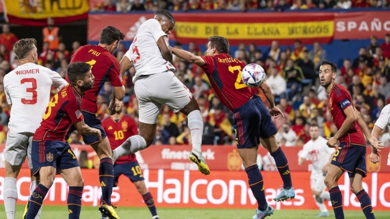 Switzerland's defender Manuel Akanji, center left, scores with a header against Spain's defender Cesar Azpilicueta to 0:1, during the UEFA Nations League group A2 soccer match between Spain and Switzerland. (Jean-Christophe Bott/AP)