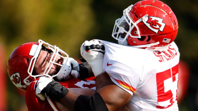 Kansas City Chiefs offensive tackle Ryan Hunter, left, and defensive end Breeland Speaks (57) take part in a drill during NFL football training camp Thursday, Aug. 2, 2018, in St. Joseph, Mo. (Charlie Riedel/AP)