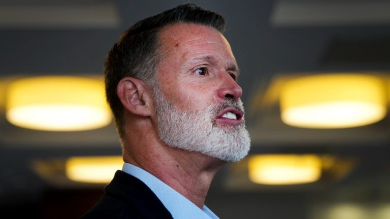 Mark Tewksbury, Canadian Olympic Champion Swimmer speaks with the Canadian media before attending the funeral service for the late Queen Elizabeth II in London on Sunday, September 18, 2022. Queen Elizabeth II, Britain's longest-reigning monarch and a rock of stability across much of a turbulent century, died Thursday Sept. 8, 2022, after 70 years on the throne. She was 96. (Nathan Denette/CP)
