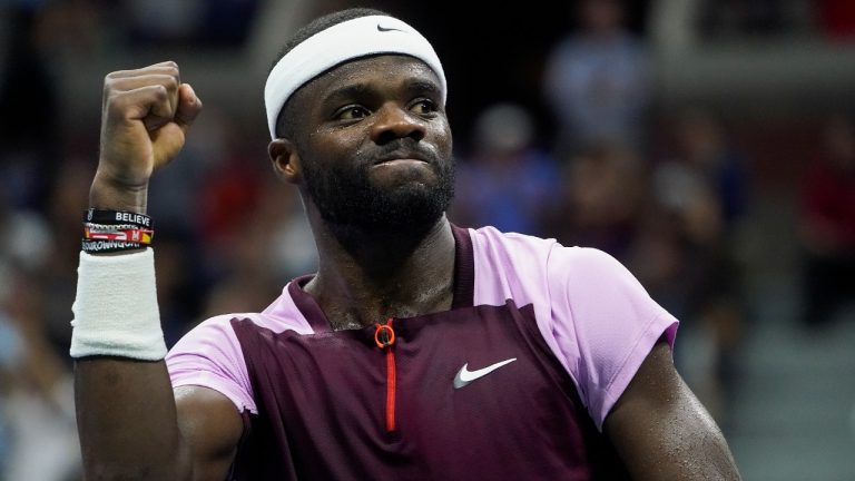 Frances Tiafoe, of the United States, reacts after scoring a point against Carlos Alcaraz, of Spain, during the semifinals of the U.S. Open tennis championships, Friday, Sept. 9, 2022, in New York. (John Minchillo/AP)