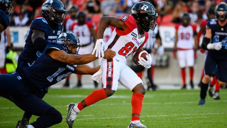 Ottawa Redblacks wide receiver Terry Williams (81) is defended by Toronto Argonauts kicker Boris Bede (14) while returning the ball during second quarter CFL action, in Toronto on Sunday July, 31, 2022. (Christopher Katsarov/CP)