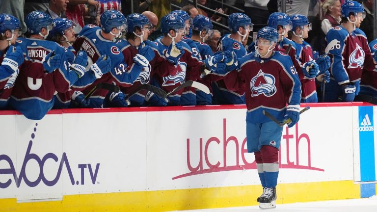 Colorado Avalanche left wing Artturi Lehkonen (62) is congratulated for his goal against the Chicago Blackhawks during the second period of an NHL hockey game Wednesday, Oct. 12, 2022, in Denver. (Jack Dempsey/AP)