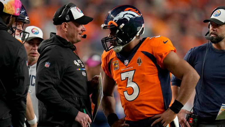 Denver Broncos quarterback Russell Wilson (3) talks with head coach Nathaniel Hackett during the second half of an NFL football game against the Indianapolis Colts, Thursday, Oct. 6, 2022, in Denver. (Jack Dempsey/AP)