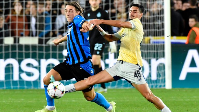 Brugge's Casper Nielsen fights for the ball against Porto's Stephen Eustaquio during the Champions League Group B soccer match between Club Brugge and FC Porto at the Jan Breydel stadium in Bruges, Belgium, Wednesday, Oct. 26, 2022. (Geert Vanden Wijngaert/AP)