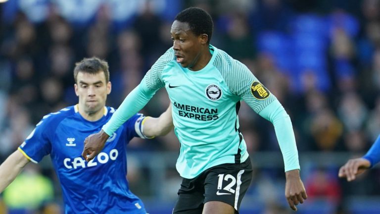 Brighton's Enock Mwepu, right, battles for the ball with Everton's Seamus Coleman during the English Premier League soccer match between Everton and Brighton at Goodison Park stadium in Liverpool, England, Sunday, Jan. 2, 2022. (Jon Super/AP)