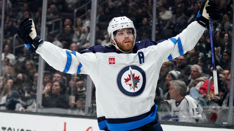 Winnipeg Jets center Adam Lowry celebrates his goal during the first period of an NHL hockey game against the Los Angeles Kings Thursday, Oct. 27, 2022, in Los Angeles. (AP)
