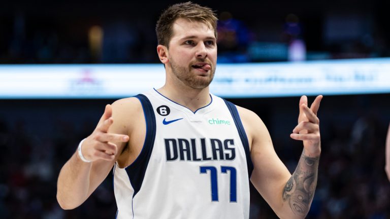 Dallas Mavericks guard Luka Doncic (77) celebrates after a 3-point basket during the first half of an NBA basketball game against the Orlando Magic, Sunday, Oct. 30, 2022, in Dallas. (Brandon Wade/AP)