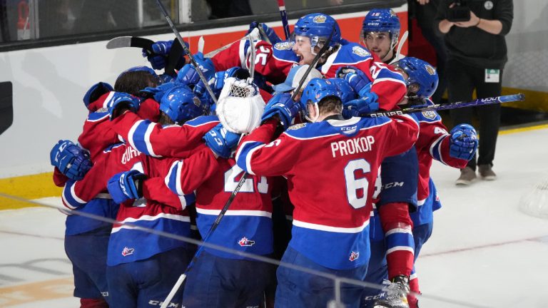 Members of the Edmonton Oil Kings celebrate their overtime-win against the Saint John Sea Dogs during Memorial Cup hockey action in Saint John, N.B. on Wednesday, June 22, 2022. (Darren Calabrese/CP)