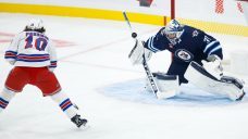 Hellebuyck turns in vintage performance in Jets’ season-opening win over Rangers