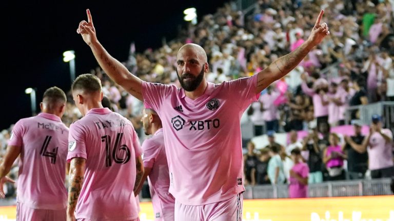 Inter Miami forward Gonzalo Higuai­n, right, celebrates after scoring a goal during the first half of an MLS soccer match against FC Cincinnati, Saturday, July 30, 2022, in Fort Lauderdale, Fla. (Lynne Sladky/AP)