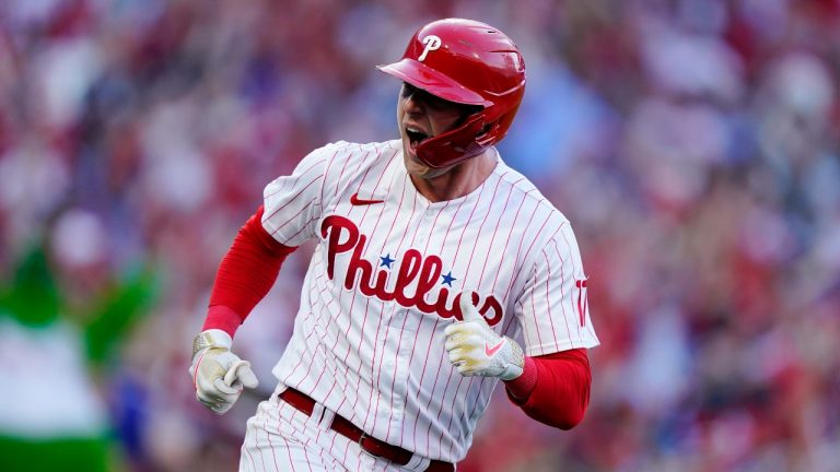 Philadelphia Phillies first baseman Rhys Hoskins (17) celebrates after hitting a three-run home run during the third inning in Game 3 of baseball's National League Division Series against the Atlanta Braves, Friday, Oct. 14, 2022, in Philadelphia. (Matt Rourke/AP)