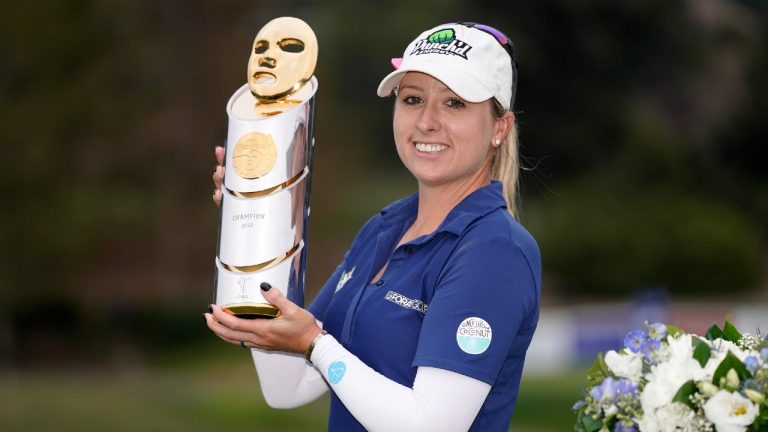 Jodi Ewart Shadoff, of England, poses with her trophy after winning the MEDIHEAL Championship golf tournament Sunday, Oct. 9, 2022, in Camarillo, Calif. (Mark J. Terrill/AP)