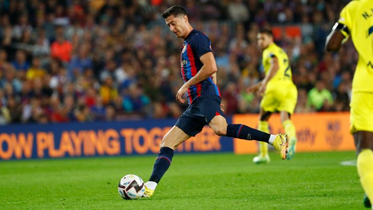 Barcelona's Robert Lewandowski shots the ball during the Spanish La Liga soccer match between FC Barcelona and Villareal at Camp Nou stadium in Barcelona, Spain, Thursday, Oct. 20, 2022. (Joan Monfort/AP Photoo)