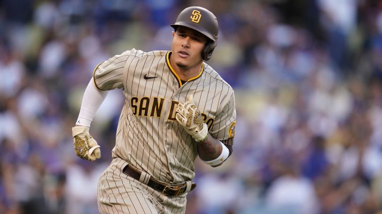 San Diego Padres' Manny Machado rounds first base after hitting a solo home run during the first inning of Game 2 of the baseball team's NL Division Series against the Los Angeles Dodgers, Wednesday, Oct. 12, 2022, in Los Angeles. (Ashley Landis/AP)