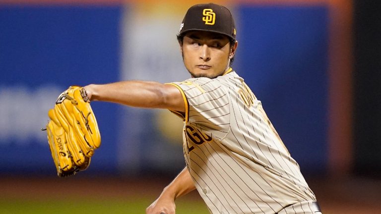 San Diego Padres starting pitcher Yu Darvish (11) delivers against the New York Mets during the first inning of Game 1 of a National League wild-card baseball playoff series, Friday, Oct. 7, 2022, in New York. (John Minchillo/AP)