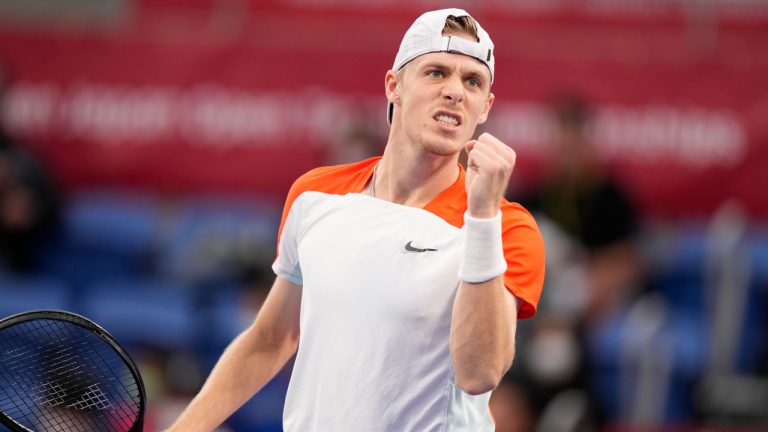 Denis Shapovalov of Canada reacts after gaining a point against Taylor Fritz of the U.S. during their semifinal match in the Japan Open tennis championships in Tokyo, Saturday, Oct. 8, 2022. (Hiro Komae/AP)