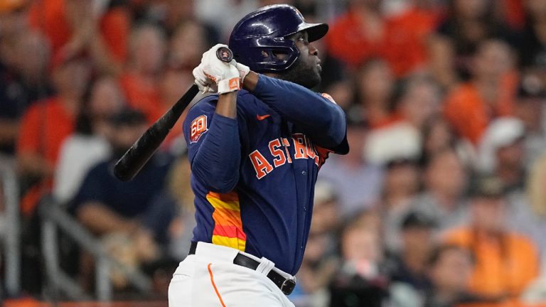 Houston Astros designated hitter Yordan Alvarez watches his two-run home run against the Seattle Mariners during the sixth inning in Game 2 of an American League Division Series baseball game in Houston, Thursday, Oct. 13, 2022. (David J. Phillip/AP)