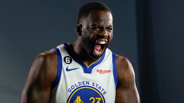 Golden State Warriors forward Draymond Green poses for a photograph during an NBA basketball media day in San Francisco, Sunday, Sept. 25, 2022. 