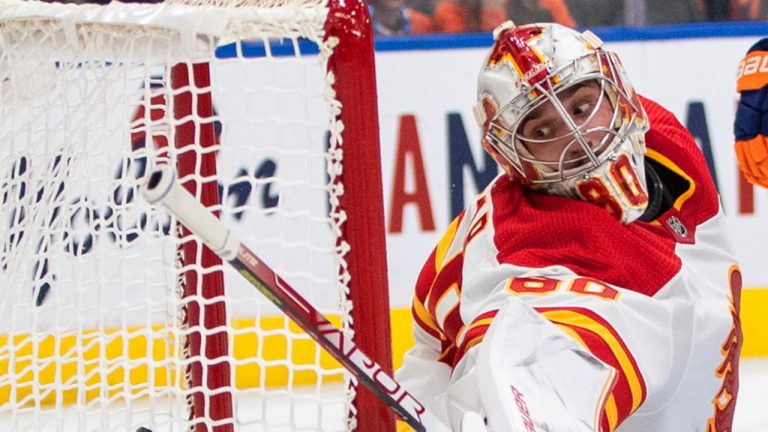 Calgary Flames goalie Dan Vladar (80) is scored on by the Edmonton Oilers during second period NHL action in Edmonton on Saturday, October 15, 2022.THE CANADIAN PRESS/Jason Franson 