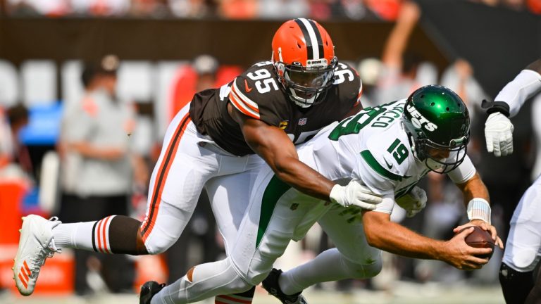 Cleveland Browns defensive end Myles Garrett (95) sacks New York Jets quarterback Joe Flacco (19) during the first half of an NFL football game, Sunday, Sept. 18, 2022, in Cleveland. (David Richard/AP)