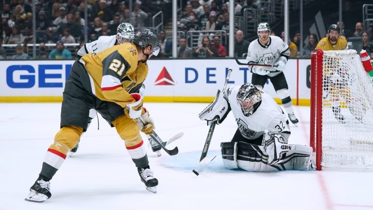 Los Angeles Kings goaltender Jonathan Quick, right, stops a shot by Vegas Golden Knights' Brett Howden during the first period of an NHL hockey game Tuesday, Oct. 11, 2022, in Los Angeles. (Jae C. Hong/AP Photo)