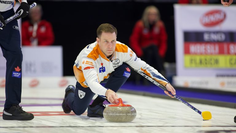 Brad Gushue delivers a rock during Draw 11 of the Boost National at Memorial Gardens in North Bay, Ont. (Anil Mungal)