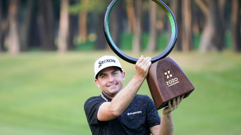 Keegan Bradley of the United States holds the trophy after winning the final round of the Zozo Championship golf tournament at Accordia Golf Narashino Country Club. (Tomohiro Ohsumi/AP)