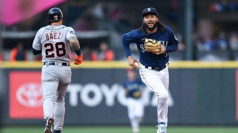 Seattle Mariners shortstop J.P. Crawford smiles after getting the out on Detroit Tigers' Javier Baez during the fifth inning of the first game of a baseball doubleheader. (Caean Couto/AP)